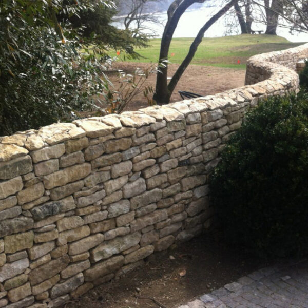 réalisation d'un mur en moellons pierre calcaire