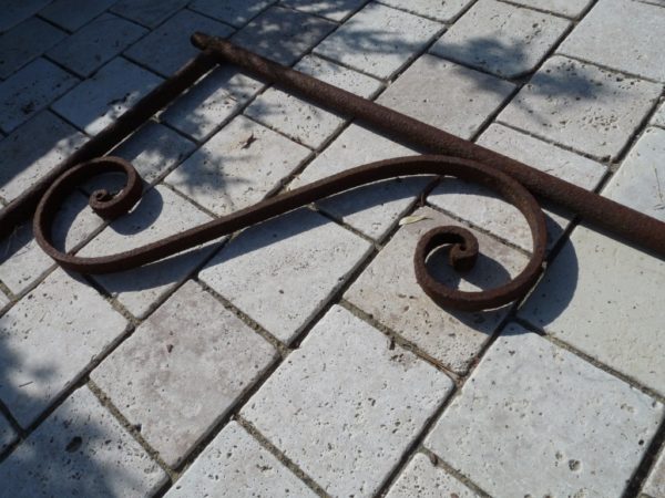 Antique wrought iron support arm