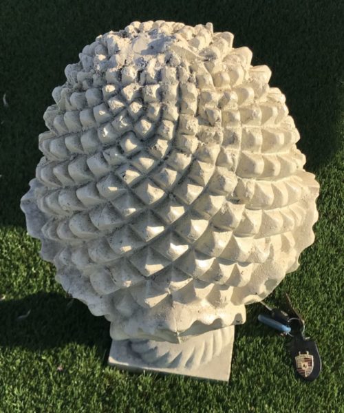 pine cone in cast iron entry property
